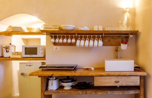 Sasso Barisano Apartment | Suite in cave with terrace and view of Sassi di Matera