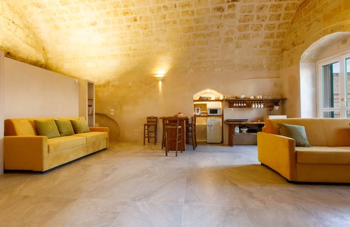 Sasso Barisano Apartment | Suite in cave with terrace and view of Sassi di Matera