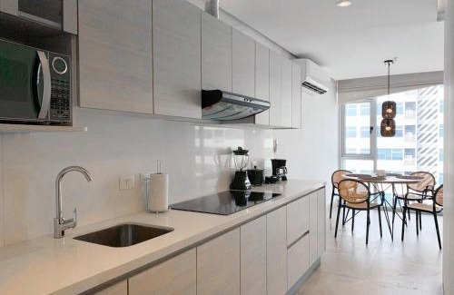 Simon Bolivar Apartment | Suites cerca del aeropuerto - terminal terrestre y centros comerciales