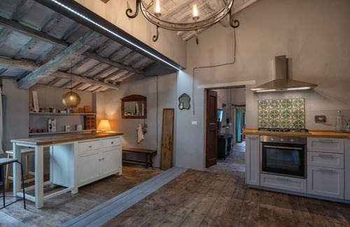 Ferretto Apartment | Sunlit Tuscan Farmhouse with a Lush Garden