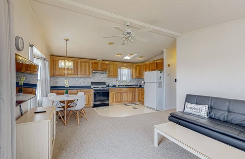 Assateague Pointe House | Sunny coastal home with private patio, on-site pool, central AC, & W/D