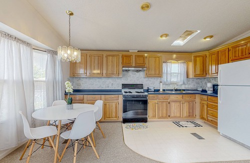 Assateague Pointe House | Sunny coastal home with private patio, on-site pool, central AC, & W/D
