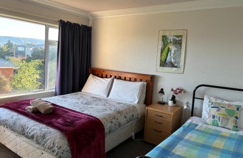 Dunedin House | Sunny, Comfortable and Quiet温馨 family shared room