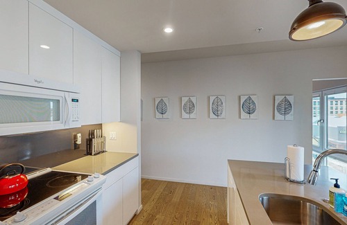 Uptown Condo | Sunny Condo in New Building with Great Walkable Locale