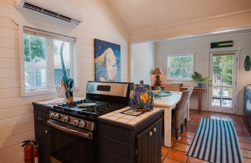 Lubbers Quarters Cay Cottage | Sunny Delight 2 bdrm cottage with boat lift and private dock