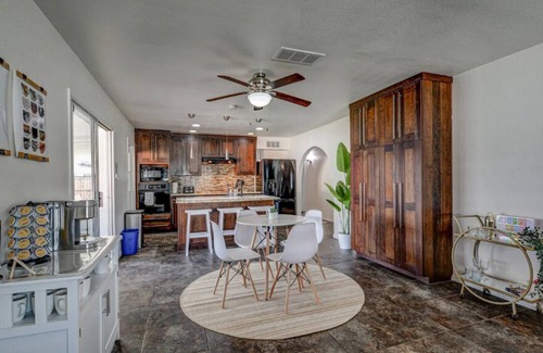 Cox Heights House | Sunny Retreat! Heated Pool at no charge - Large Backyard - Outdoor TV & Games