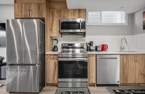 Calgary Apartment | Sunny Walk-out Unit, Free HiSpeed Wi-Fi and Parking, Near Grocery