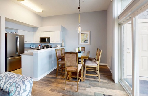 North Ocean City Condo | Sunny Waterfront Condo w/Canal Views, Balcony, Central AC, Shared Pool & Tennis