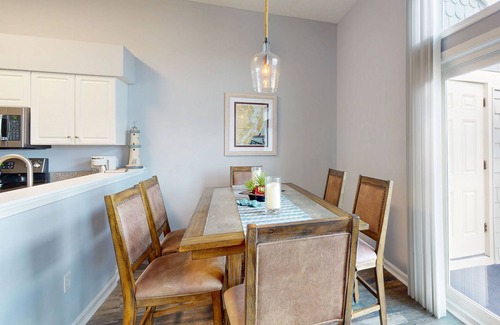 North Ocean City Condo | Sunny Waterfront Condo w/Canal Views, Balcony, Central AC, Shared Pool & Tennis
