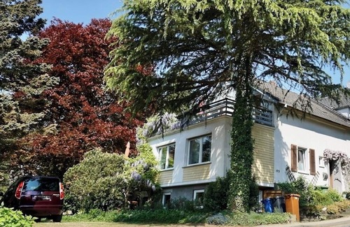 Neuwied Apartment | Sunny, with a 25 m2 renovated, green wooden balcony with a beautiful view.