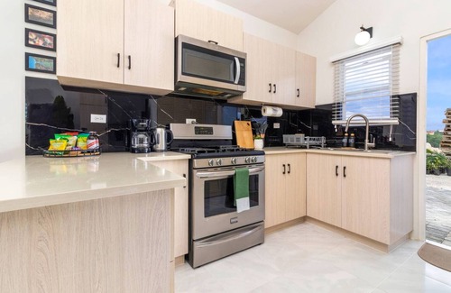 Discovery Bay House | Sunset@ArecaHomes~ Beach Access~ Pool & Water Park