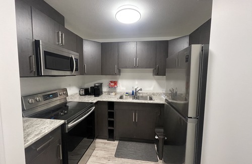 Saskatoon House | Sunset at Prairie Luxury Suite with NE Swale View