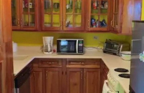 Orange Bay Condo | Sunset Villa Negril, Jamaica Beautiful beach front 3 BR vacation property.