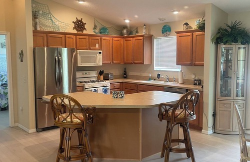 Lynnhaven House | Sunsets on the Sands in the Villages! Golf Front 3/2n Newly Remodel MasterBath!