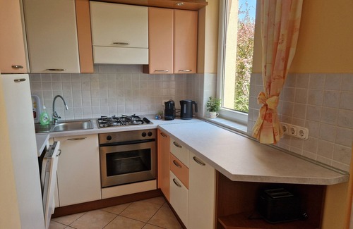 Szantod House | Sunshine Beach House DIRECTLY ON THE LAKE, ROWBOAT, Garden/barbecue island, WiFi