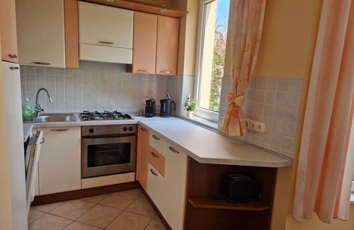 Szantod House | Sunshine Beach House DIRECTLY ON THE LAKE, ROWBOAT, Garden/barbecue island, WiFi