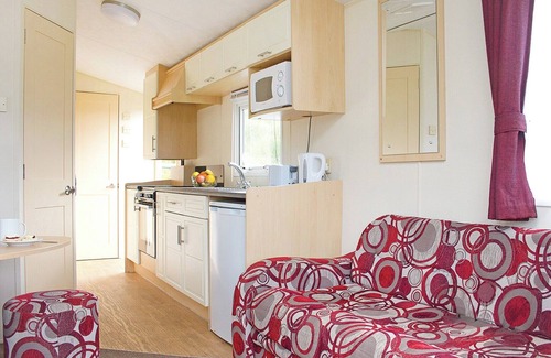 Looe House | Superior caravan with one double and one twin.