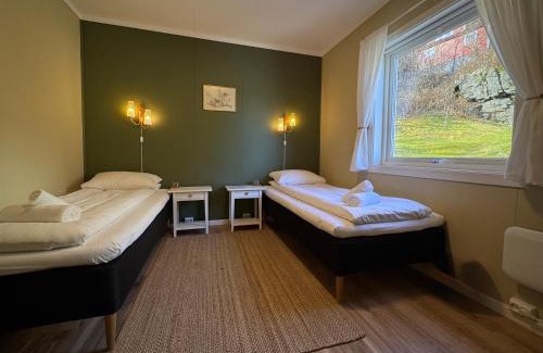 Flåm House | Svingen Guesthouse - Panoramic Fjord Views in Flåm