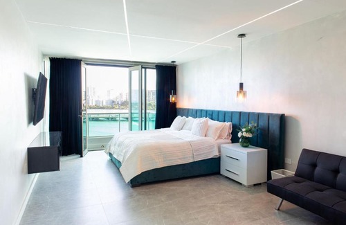 Puerta de Tierra Apartment | Swanky Oceanside Condado Penthouse