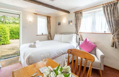 Rackheath House | Swift Host - Studio - Barn Cottage - Garden - Parking