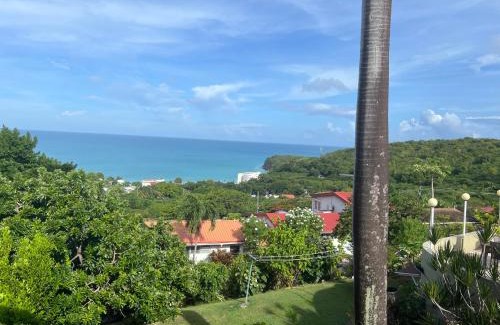 Dickenson Bay Apartment | Swimming Pool- Balcony Veranda- Sea & Sunset Views