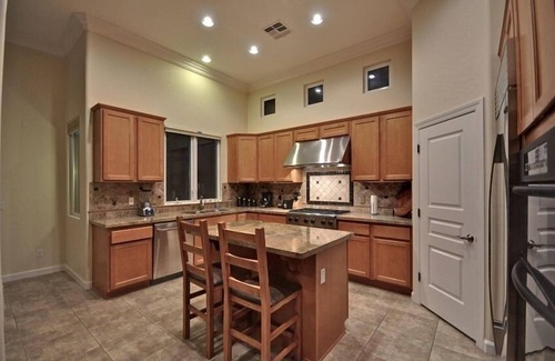 Talon Retreat House | 'SWINGING BRIDGE' Gated, Golf Course Home.