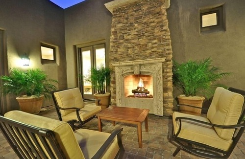 Talon Retreat House | 'SWINGING BRIDGE' Gated, Golf Course Home.