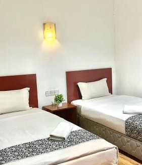 Downtown Kota Kinabalu Hotel | Switz Paradise Hotel - 5 minute walk to Centre Point and 10 minute walk to waterfront-