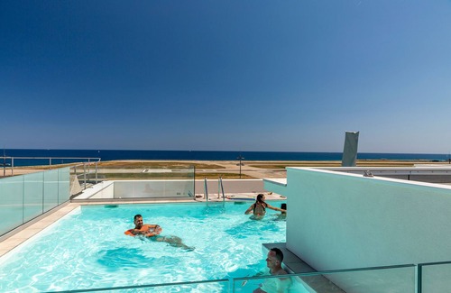 La Californie Condo | T1 à 5 min du Centre Affaires | TV | Wifi | Sauna