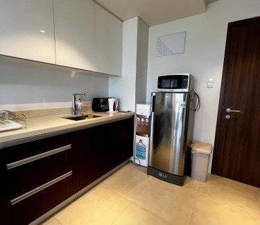 Luzon Apartment | Tambuli seaside suite with water dispenser