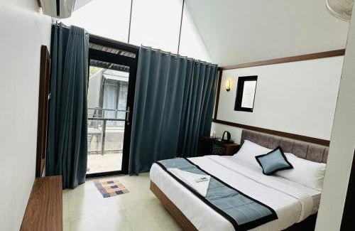 Mahe Hotel | TCS Rooms Ezhilode Payyanur
