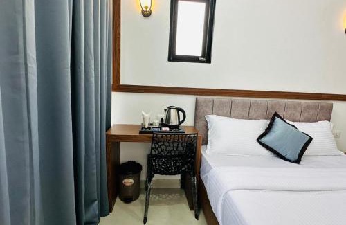Mahe Hotel | TCS Rooms Ezhilode Payyanur