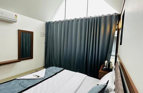 Mahe Hotel | TCS Rooms Ezhilode Payyanur