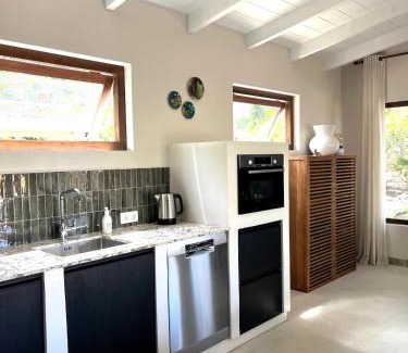 Santa Rosa Apartment | Terra77 Tropical vacation home, private garden, pool, parking and BBQ