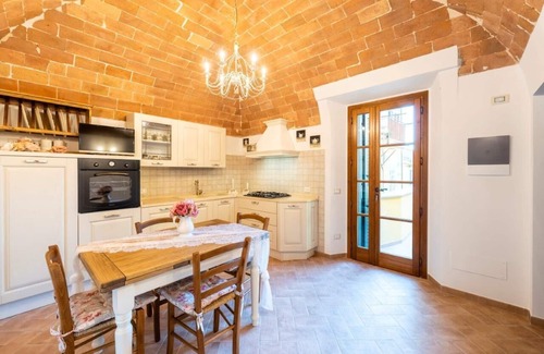 Lajatico Apartment | Terrace on the Sunset of Silence. Apartment in the center of Lajatico