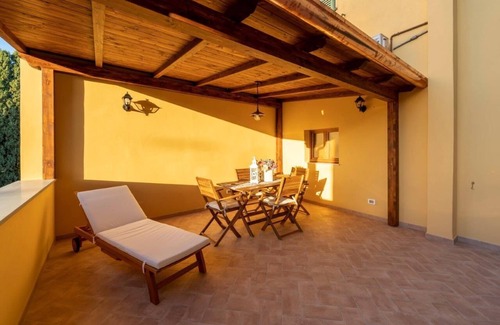 Lajatico Apartment | Terrace on the Sunset of Silence. Apartment in the center of Lajatico