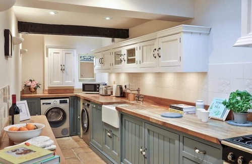 Tetbury House | Tetbury - Stylish Country Retreat, Terrace and Log