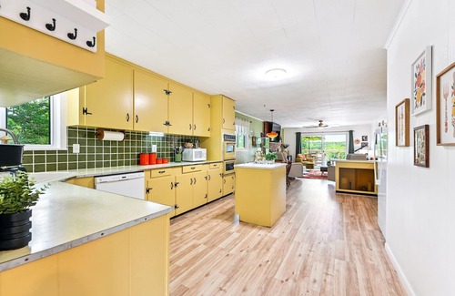 Eucha House | That 70's Lake Front Home w Dock 2-bedroom house, Hot Tub & Fire Pits in Eucha!