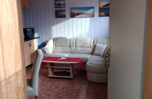 Mohlau Apartment | The apartment has approx. 40 square meters of living space, a bedroom with a double bed and en-suite bathroom and another room with a kitchenette.
