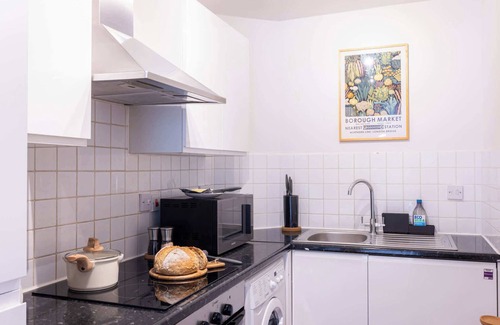 Vincent Square Apartment | The Atrium: High Ceilings & Workspace, Victoria