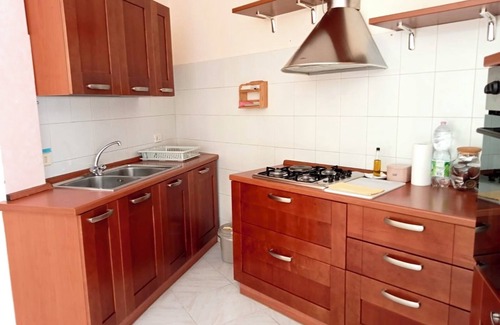 Niscemi Apartment | The attic of the sculptor