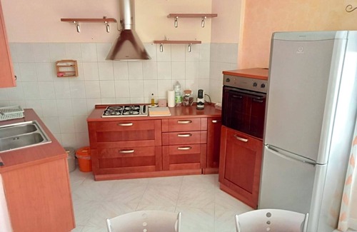 Niscemi Apartment | The attic of the sculptor