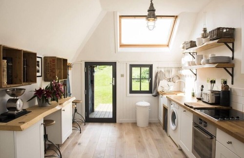 Ardroil Cottage | THE BARN AT REEF, pet friendly, with open fire in Timsgearraidh