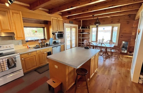 Pontiac Ski Chalet | The Beacon - Lakefront Log Home for Families, a quiet summer or winter paradise!