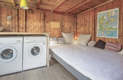 Holbaek House | The charming cottage is located by the forest Bognæs Skov, a good destination for hiking.