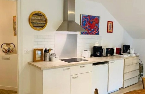 Commarin Apartment | The colors of Commarin 2-bedroom apartment with kitchen.