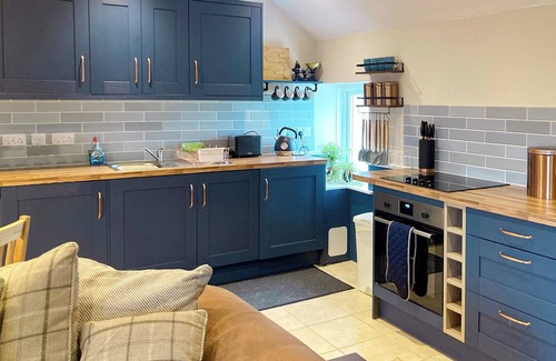Benbecula Cottage | The cottage is so attractive with its traditional thatch and whitewashed walls.