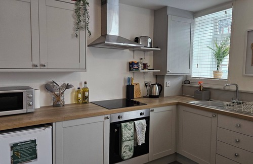 Darvel Apartment | The Ferns - Shared Garden Apartment With Parking.
