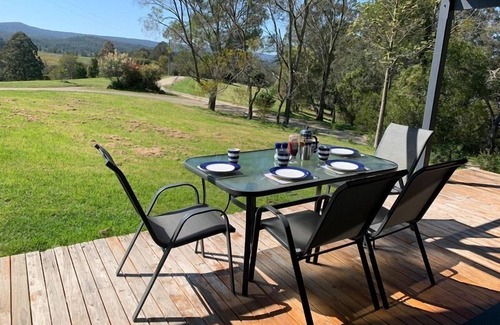 Bandon Grove Cabin | The Folly is a beautiful 2 bedroom holiday home with a log fire and fire pit.
