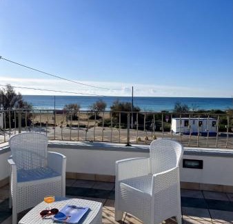 Posto Vecchio Apartment | The Front Beach Penthouse 20 m by Salento Prime